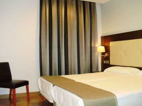 Apartamentos Boutique Catedral Valladolid Quarto foto